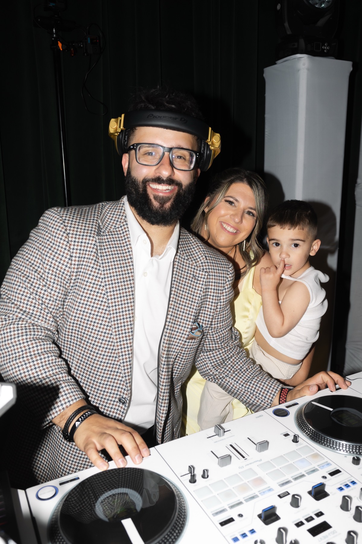 Jon at the decks with a mother and child